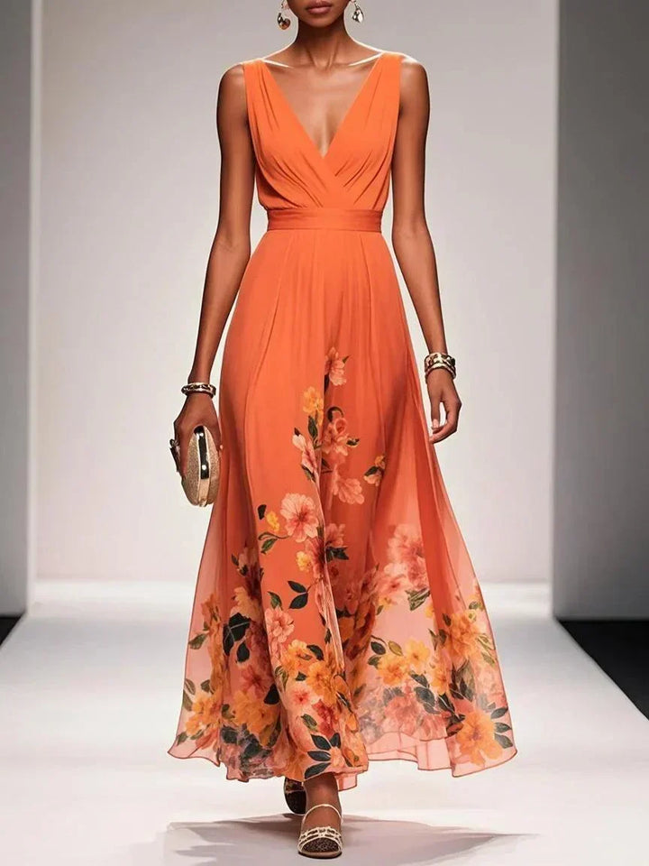 Abito donna autunnale a fiori, taglio lungo e scollo a V, per un look elegante e femminile.