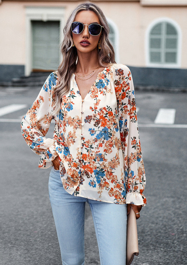 Blusa donna moda con stampa floreale autunnale, maniche lunghe, scollo a V. Versatile e confortevole.