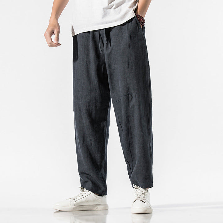 Pantaloni da uomo estivi con coulisse, gamba larga e vestibilità rilassata alla caviglia per massimo comfort.