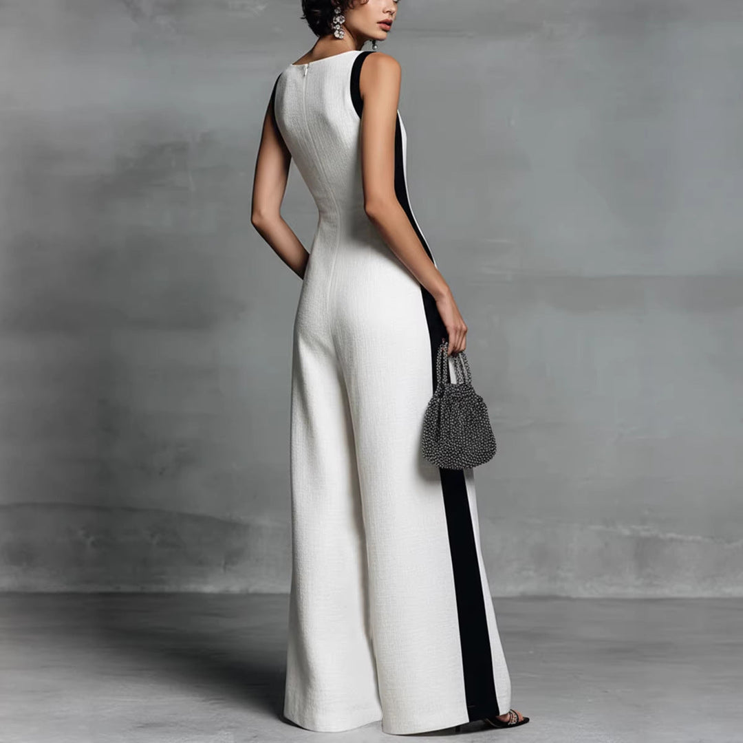 Outfit chic: tuta lunga da donna con scollo a V, pantaloni a gamba larga e dettagli patchwork.