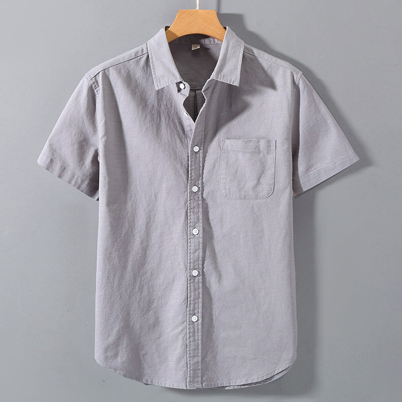 Camicia uomo estiva, maniche corte, colletto revers, taglio ampio. Per un comfort estivo e uno stile rilassato.