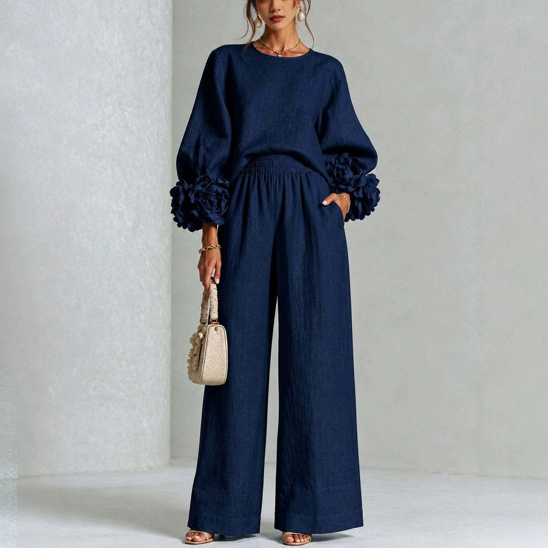 Top floreale a polsini da donna multi colore. Parte superiore del set elegante e chic, perfetto per la moda primavera.