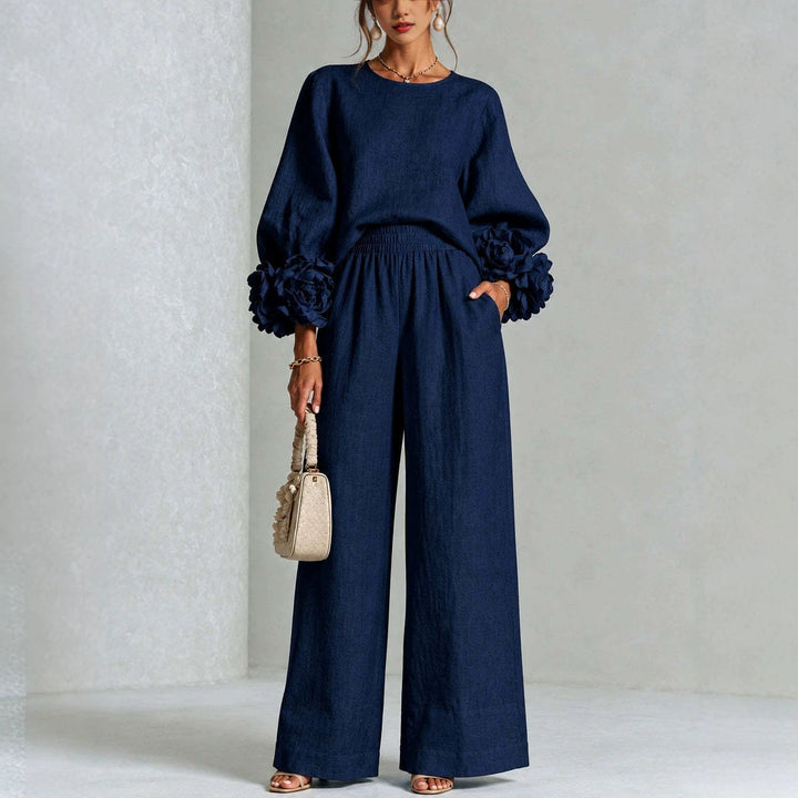 Top floreale a polsini da donna multi colore. Parte superiore del set elegante e chic, perfetto per la moda primavera.