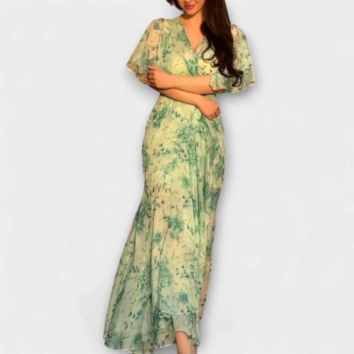 Abito floreale donna elegante con scollo a V, ideale per primavera estate e outfit vacanze.