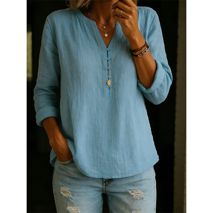 Camicia donna ampia con collo a V, elegante e casual. Ideale per primavera ed estate.
