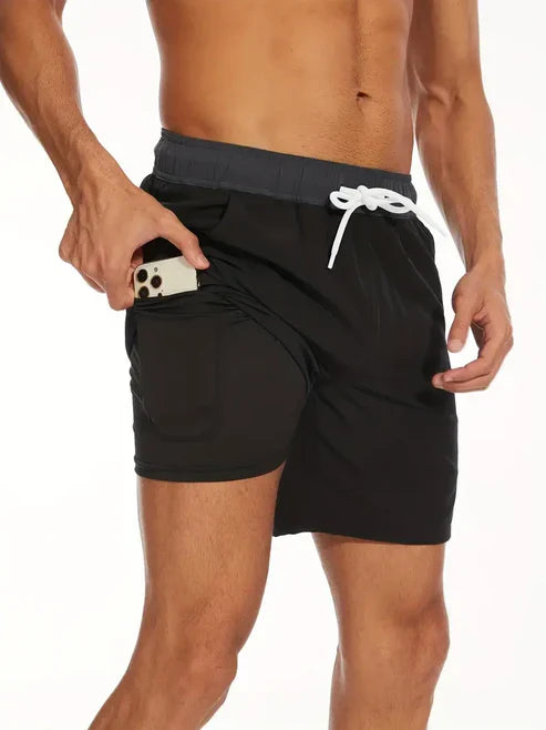 Pantaloncini sportivi neri da uomo, ideali per corsa, nuoto e fitness. Comfort e durata per ogni attività.