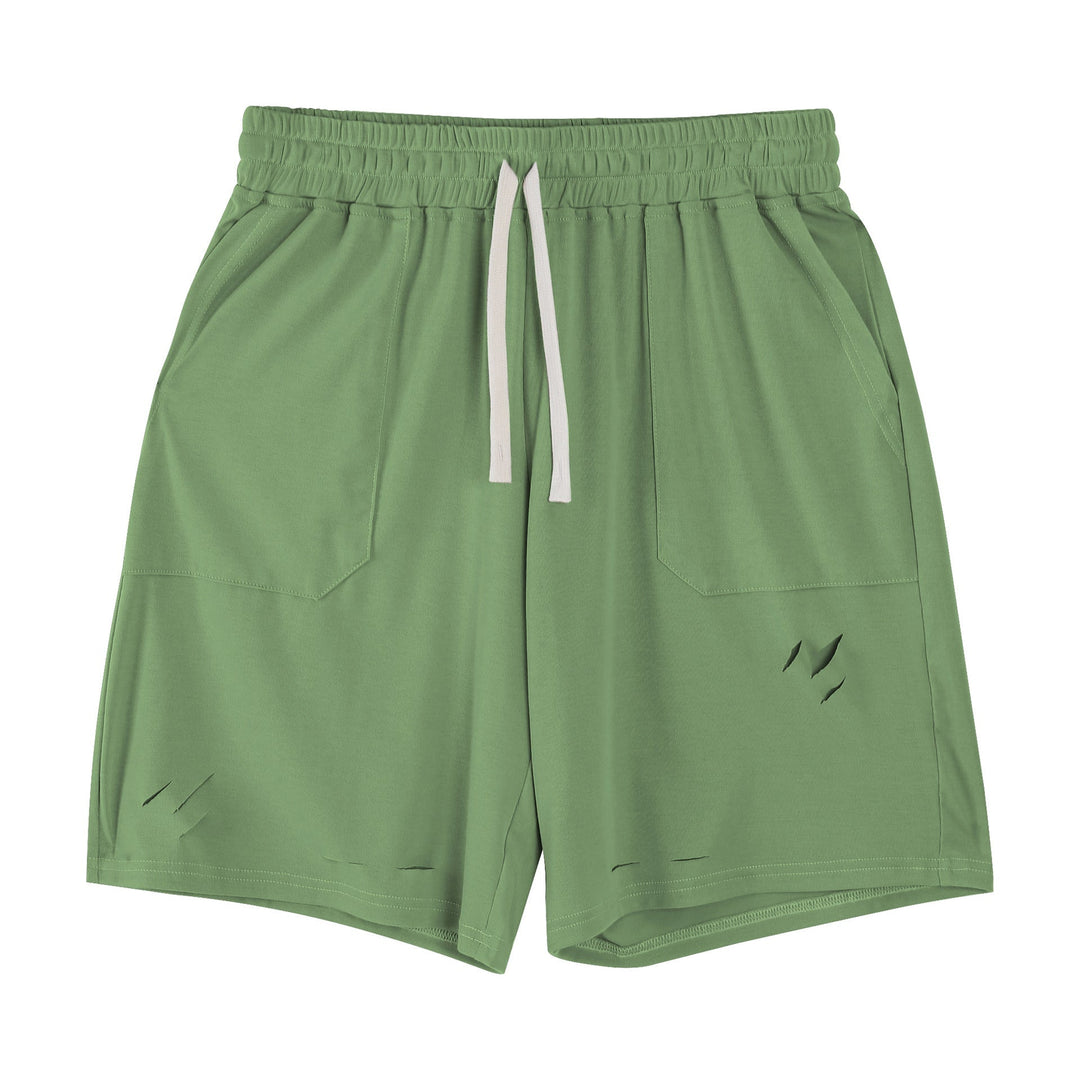 Pantaloncini uomo a vestibilità ampia con strappi, perfetti per tempo libero e look casual di tendenza.