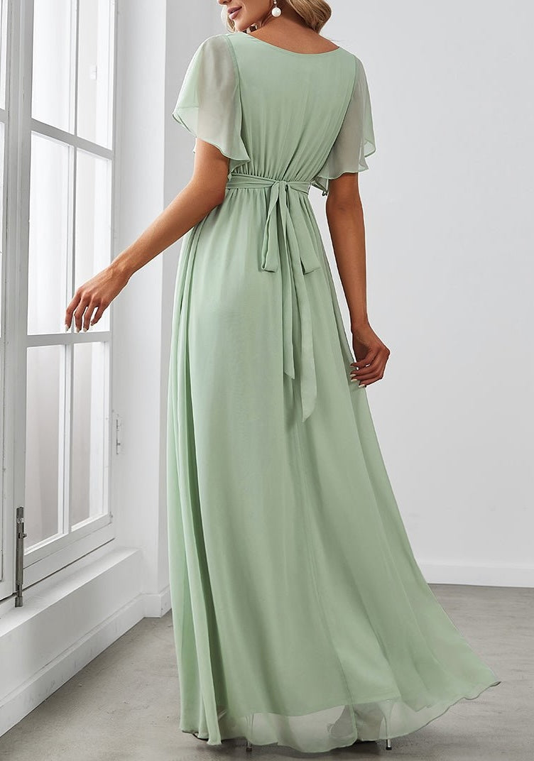 Vestito da sera verde elegante per donna, taglio trapezio. Ideale come abito lungo per invitata matrimonio o occasioni speciali.