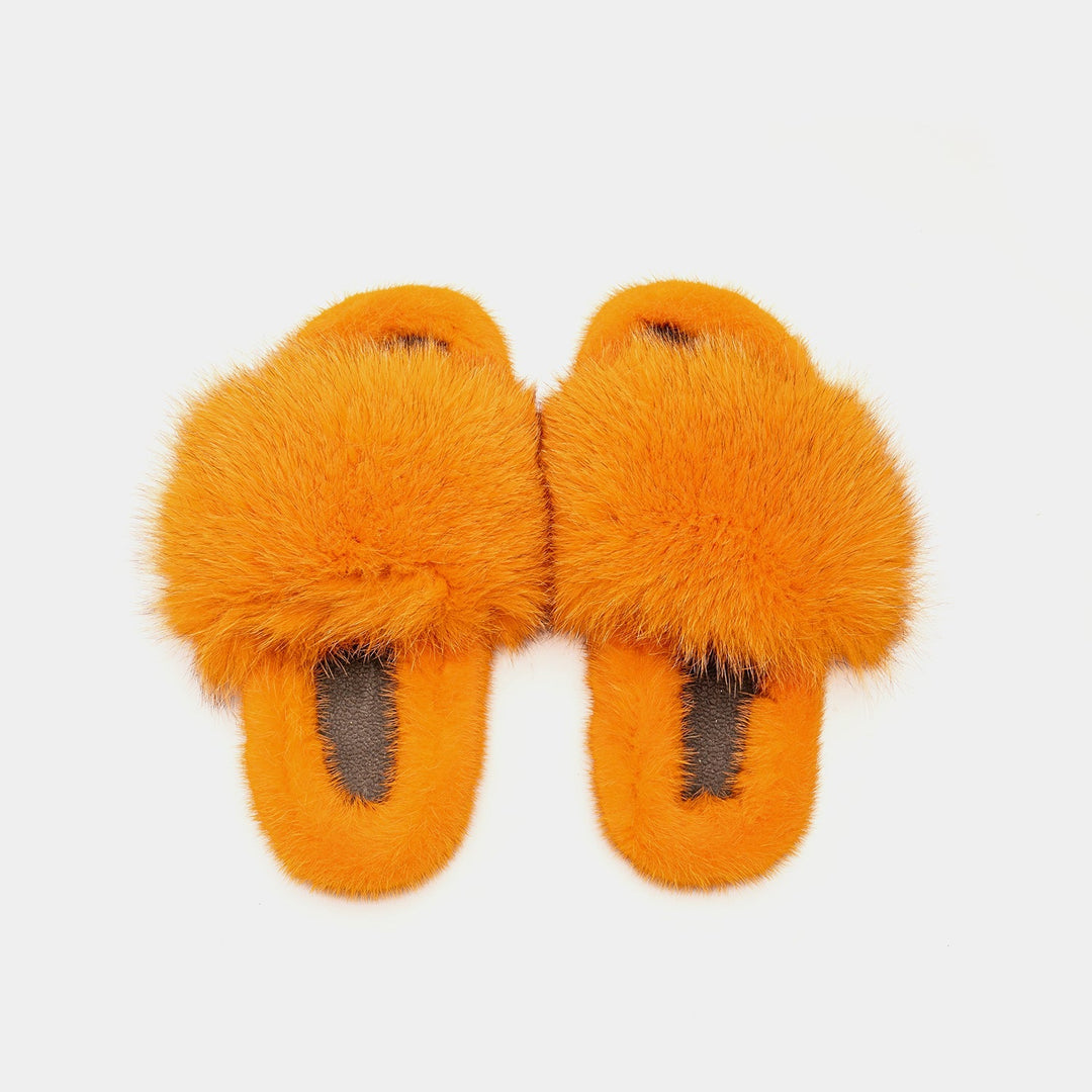 Calzature da donna lussuose: pantofole arancioni in pelliccia di volpe e visone per l'inverno.