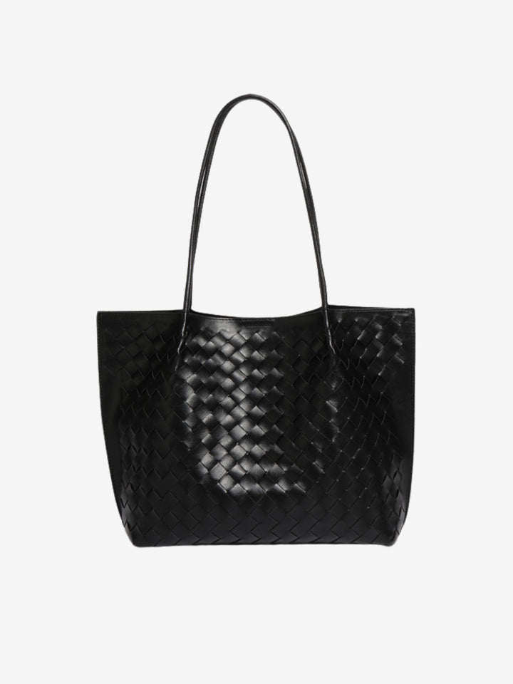 Elegante borsa tote intrecciata per donna, accessorio moda versatile e raffinato.
