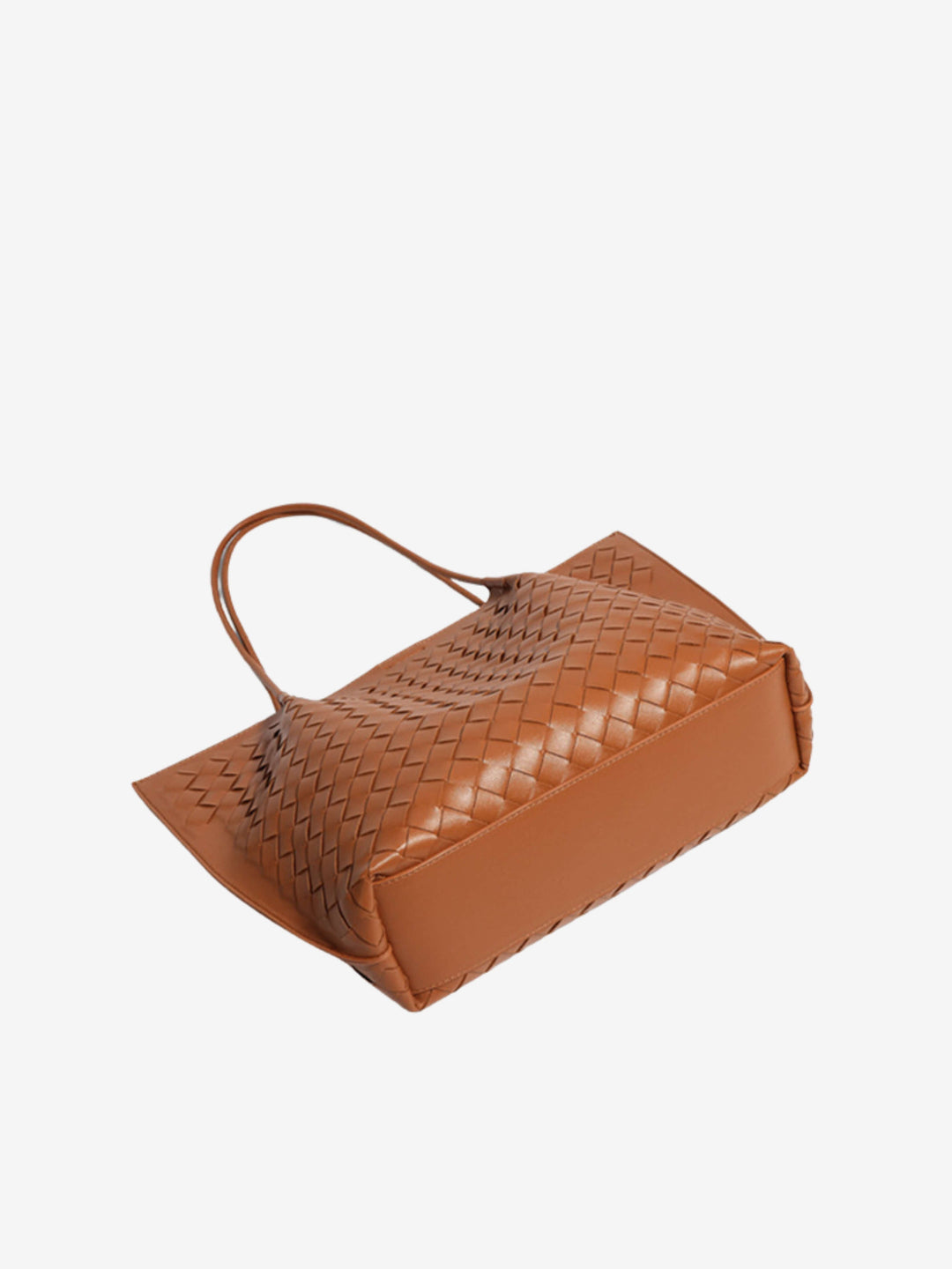 Stile e funzionalità: borsa tote intrecciata da donna, perfetta come accessorio moda o borsa lavoro.