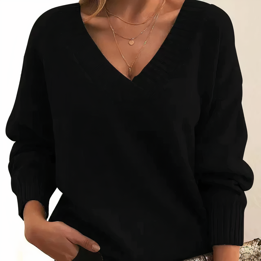 Maglione donna elegante autunnale a maniche lunghe, perfetto per comfort e stile quotidiano.