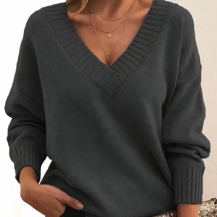 Pullover donna caldo con scollo rotondo, ideale per un outfit casual chic e accogliente in autunno.