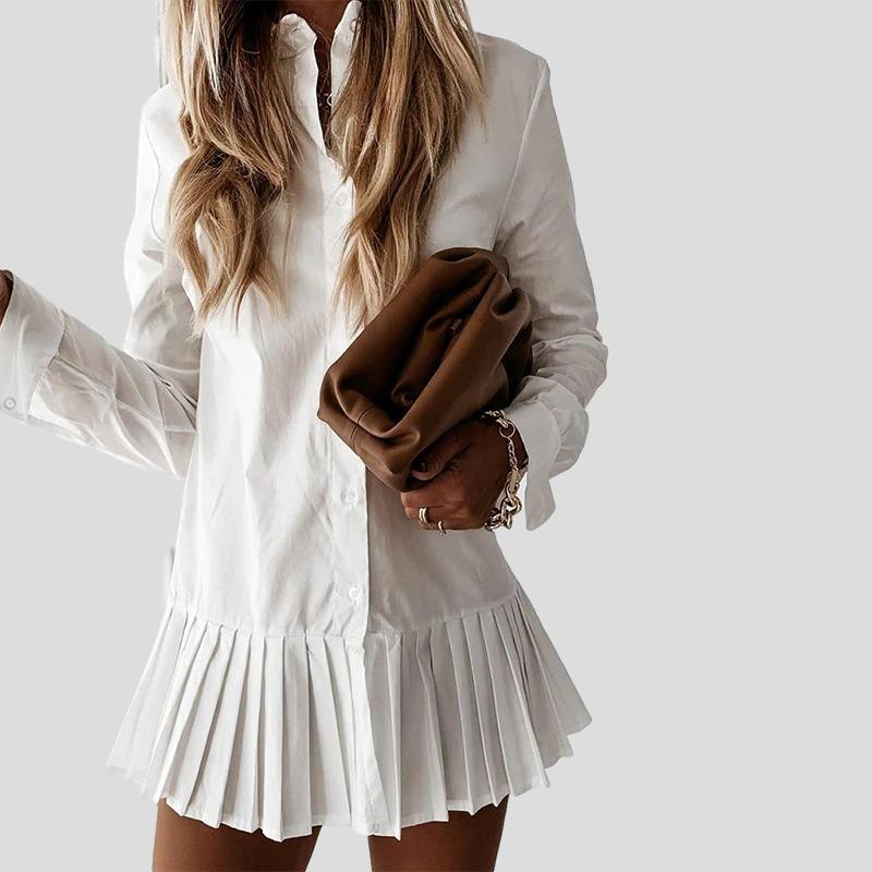 Dettaglio gonna plissettata abito camicia donna, un vestito elegante e casual chic per primavera estate.
