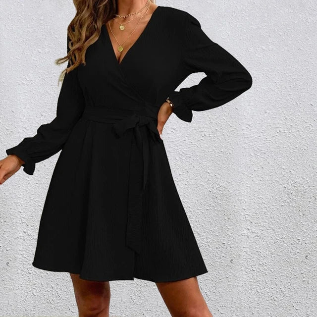 Vestito donna versatile a portafoglio con maniche a palloncino e gonna svasata, moda autunno/inverno.