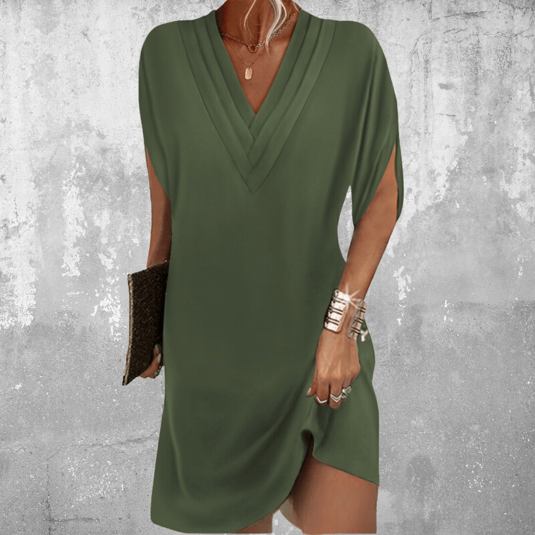 Abito elegante donna con scollo a V e maniche a pipistrello. Perfetto per cerimonia o cocktail, snellisce la figura.