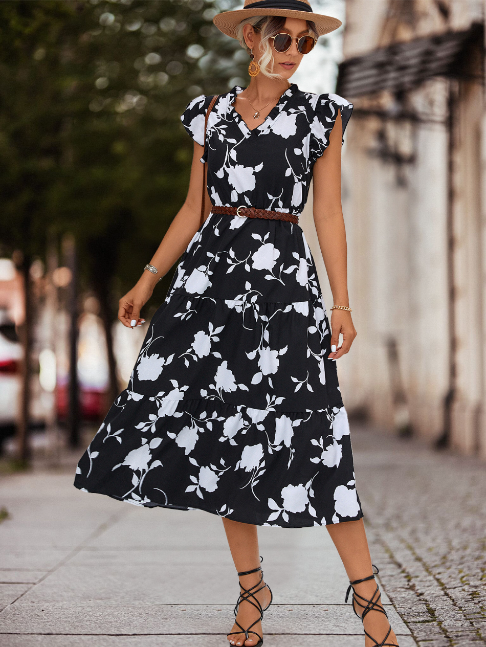 Abito estivo floreale da donna stile midi con balze fluide, scollo a V e maniche corte, perfetto per la primavera estate.