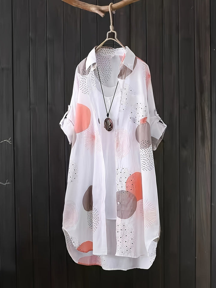 Abito donna estivo a stampa geometrica, vestibilità fluida e oversize per un look casual chic.