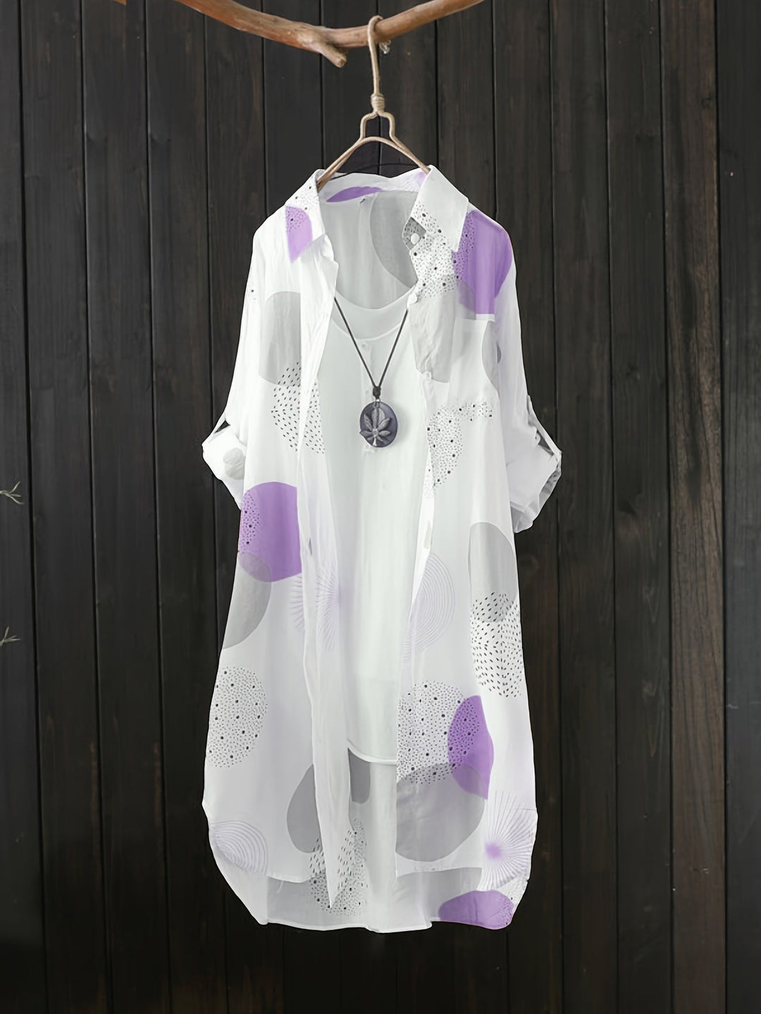 Abito donna primavera/estate a stampa geometrica, taglio fluido oversize, perfetto per look casual chic.
