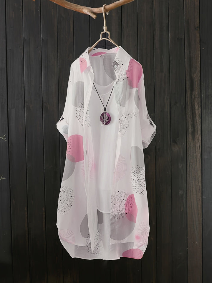 Elegante abito estivo donna con stampa geometrica, vestibilità fluida, per un comfort chic e alla moda.