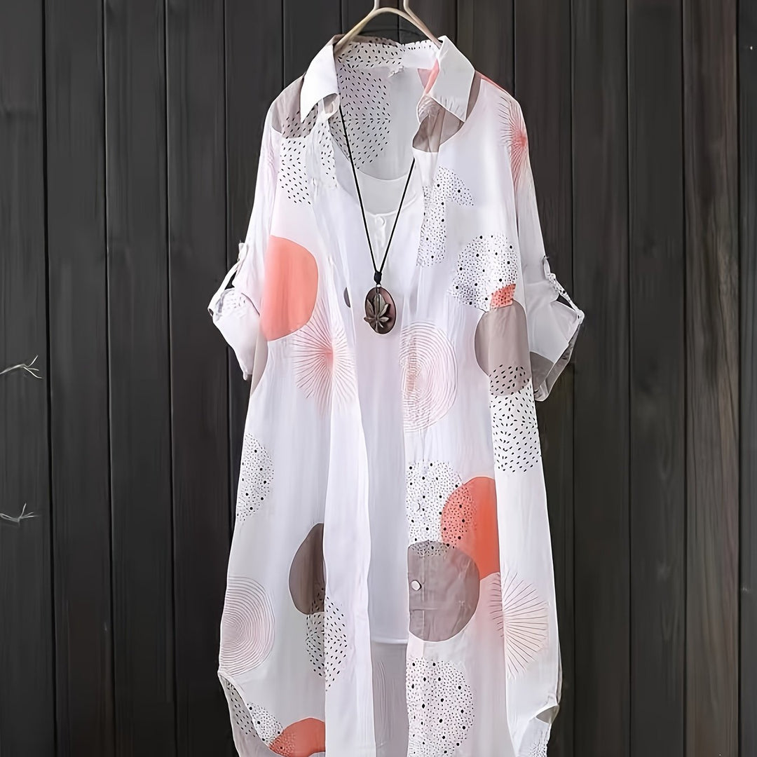 Abito estivo femminile a stampa geometrica, morbido e oversize, perfetto per un look casual e confortevole.