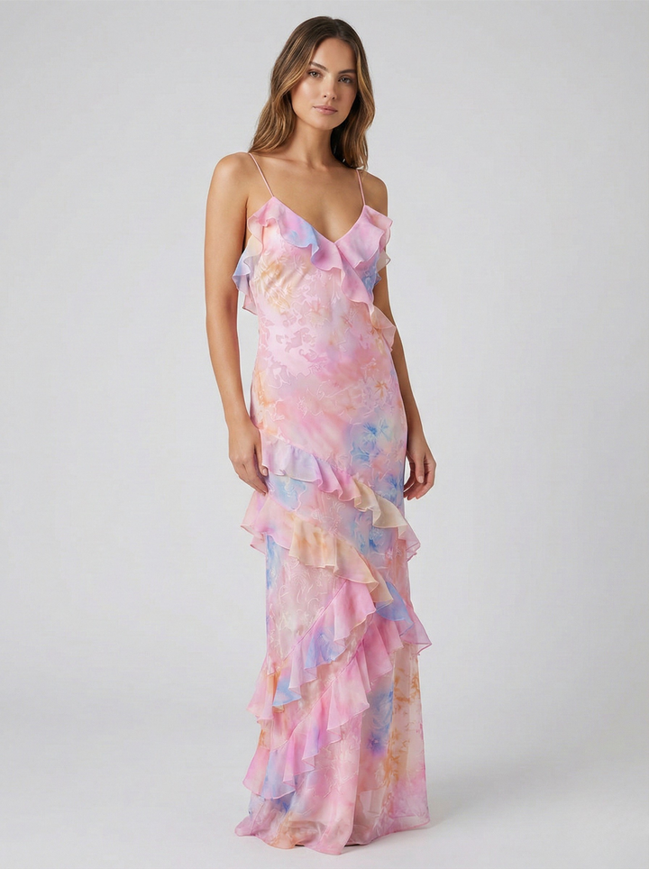 Abito lungo donna elegante con volant a cascata e stampa acquerello rosa e gialla. Perfetto per l'estate.