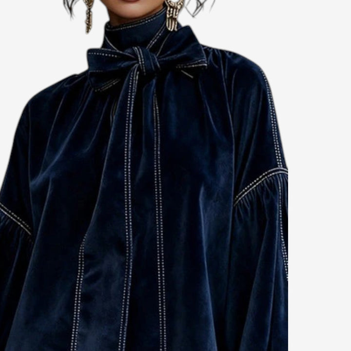 Vestito maglione donna elegante con fiocco decorativo e maniche a sbuffo. Ideale per autunno inverno.