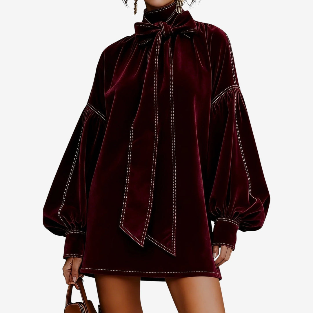 Abito maglione donna per autunno inverno, elegante con fiocco e maniche a sbuffo. Vestito moda donna.