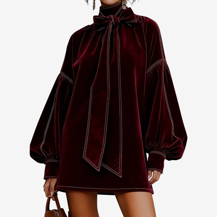 Abito maglione donna per autunno inverno, elegante con fiocco e maniche a sbuffo. Vestito moda donna.