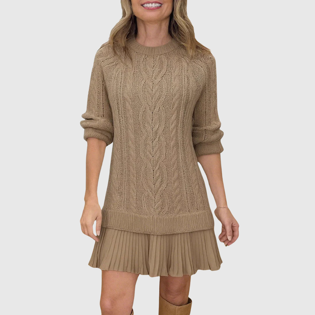 Abito maglione donna con orlo plissettato e girocollo. Eleganza avvolgente per un look autunnale chic.