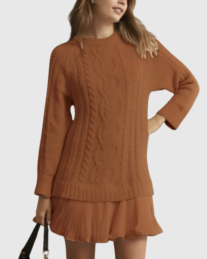 Abito maglione donna, modello girocollo. Eleganza casual con orlo plissettato, perfetto per l'autunno.