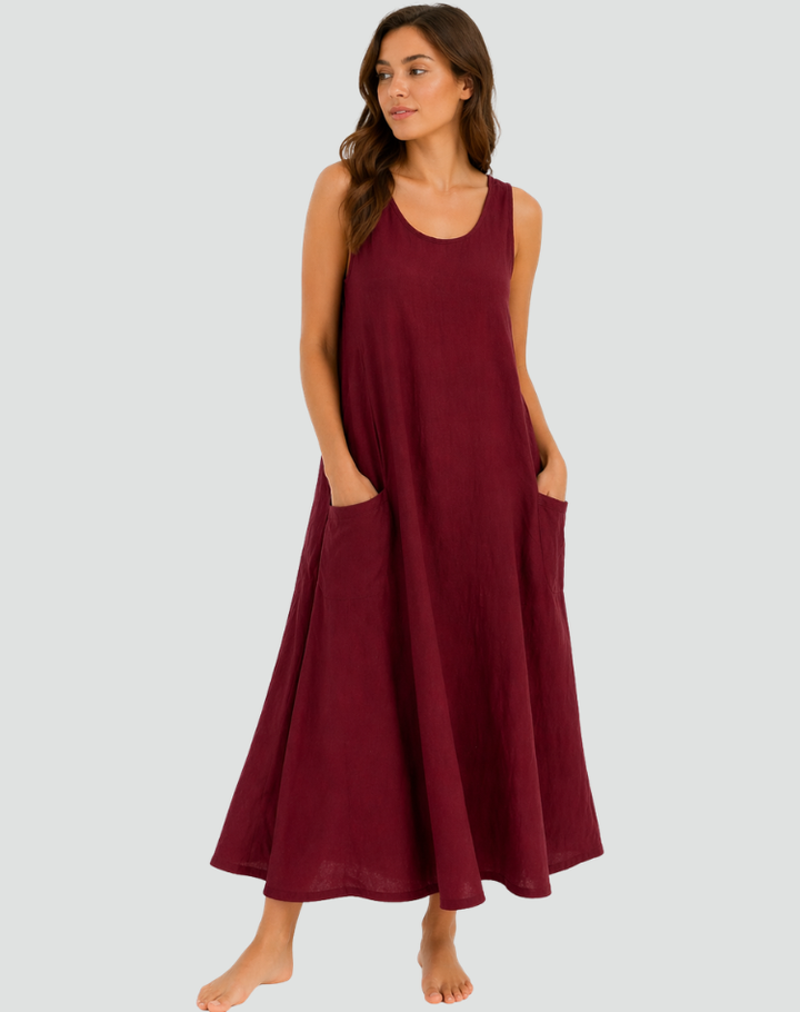 Abito maxi donna estivo, vestibilità ampia, senza maniche, girocollo e comode tasche laterali.