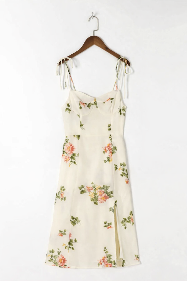 Abito midi floreale da donna con stampa romantica e vestibilità impeccabile. Ideale per la primavera.