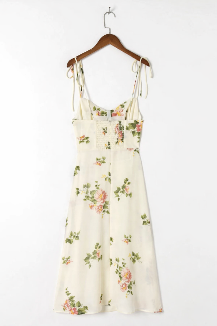 Elegante abito midi donna floreale primaverile con allacciatura. Stampa romantica, perfetto per l'estate.