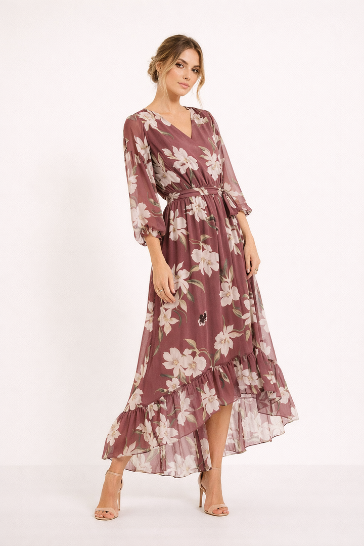 Vestito midi floreale donna con orlo asimmetrico e volant. Ideale per la moda estiva e occasioni speciali.