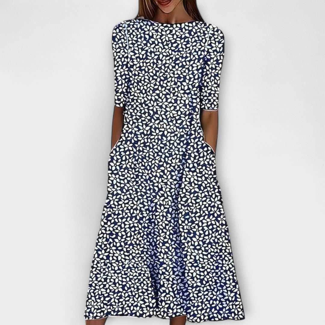 Abito midi donna romantico con fantasia floreale blu e verde. Perfetto per primavera/estate, stile femminile casual chic.