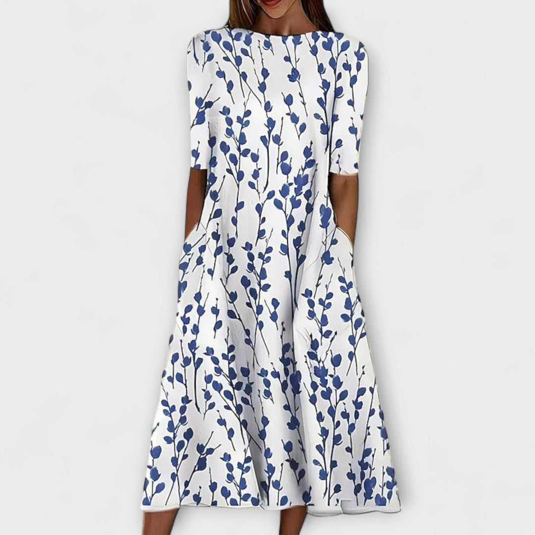 Abito midi donna floreale blu e verde, stile romantico, perfetto per primavera ed estate. Vestito casual chic femminile.