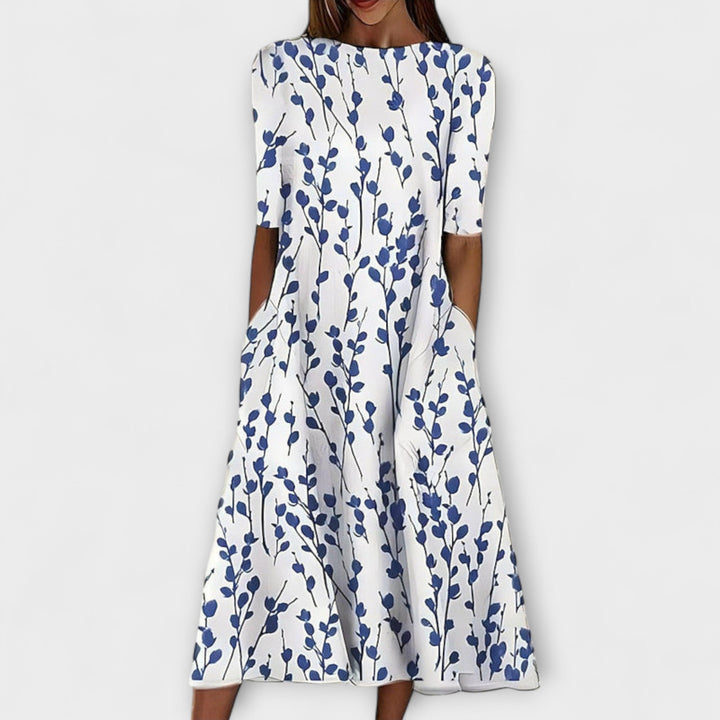 Abito midi donna floreale blu e verde, stile romantico, perfetto per primavera ed estate. Vestito casual chic femminile.