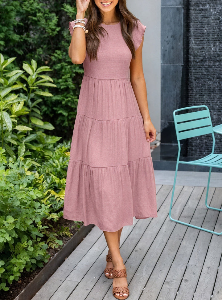 Abito donna midi a balze per un comfort eccezionale e uno stile svasato. Perfetto per la moda estiva femminile.