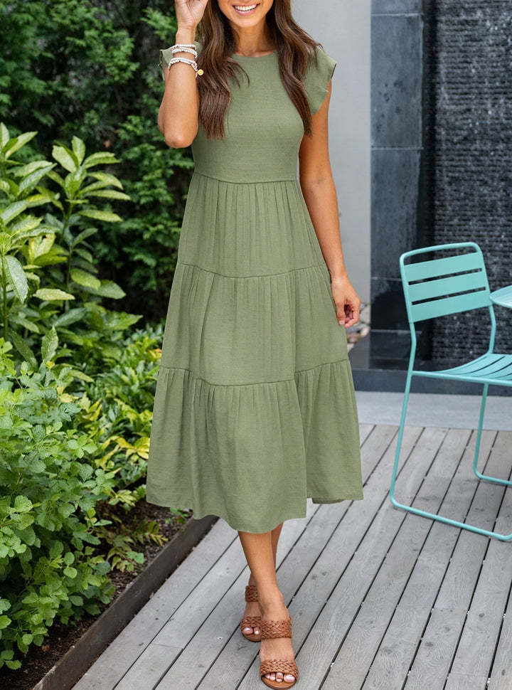Abito midi donna svasato con balze, perfetto per primavera/estate. Vestito estivo elegante e confortevole.