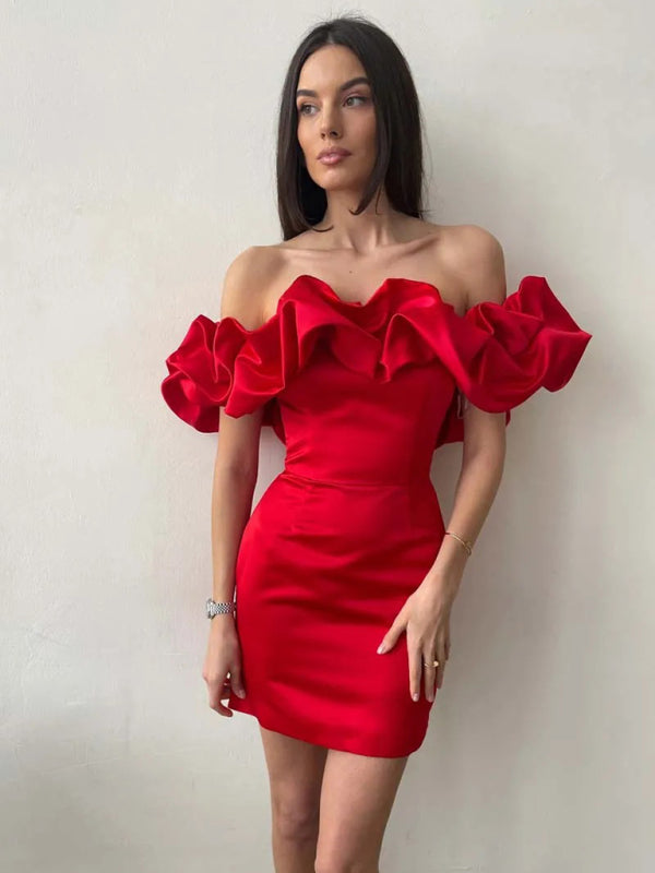 Mini abito donna off-shoulder con delicati volant, perfetto per cerimonie e look da sera estivi.