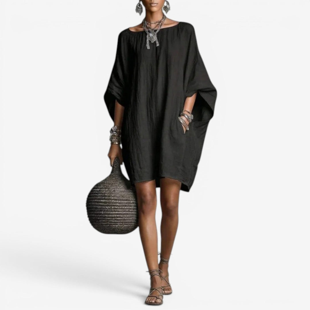 Vestito estivo donna fluido oversize, ideale per il casual chic. Mini abito comodo e alla moda per l'estate.