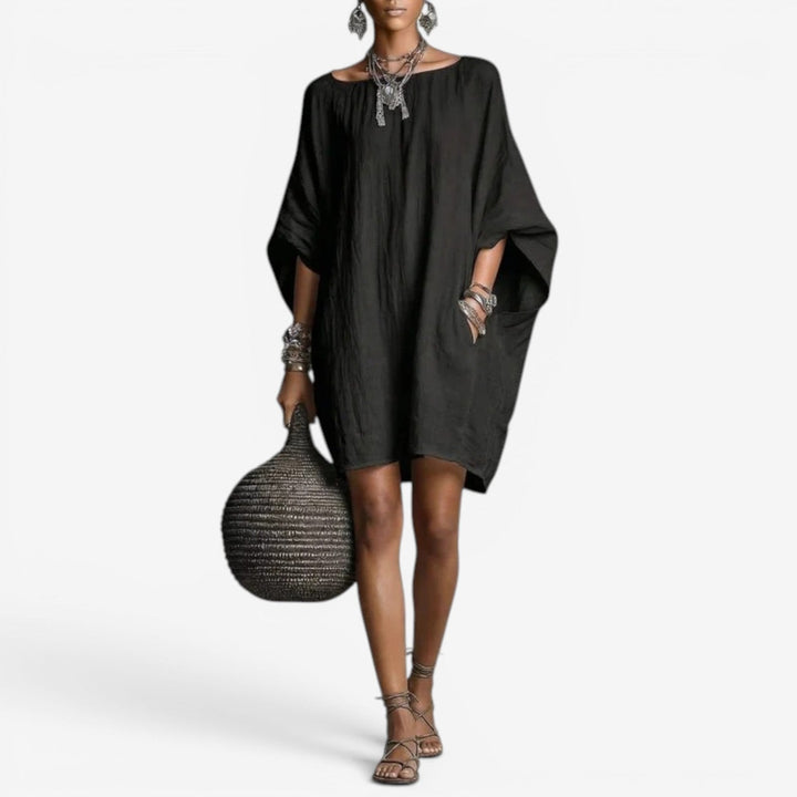 Vestito estivo donna fluido oversize, ideale per il casual chic. Mini abito comodo e alla moda per l'estate.