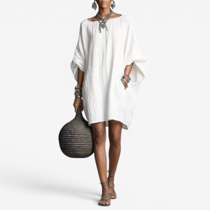 Mini abito estivo donna oversize e fluido, perfetto per look casual chic primavera estate.