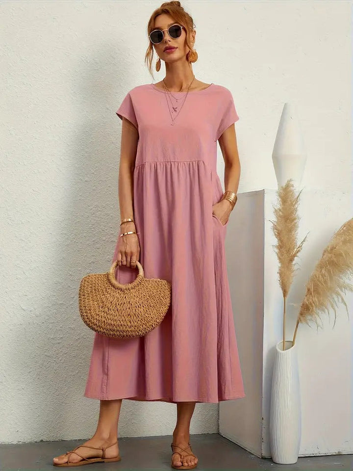 Abito tascabile donna midi, vestito comodo con vestibilità fluida, versatile per outfit casual ed eleganti.