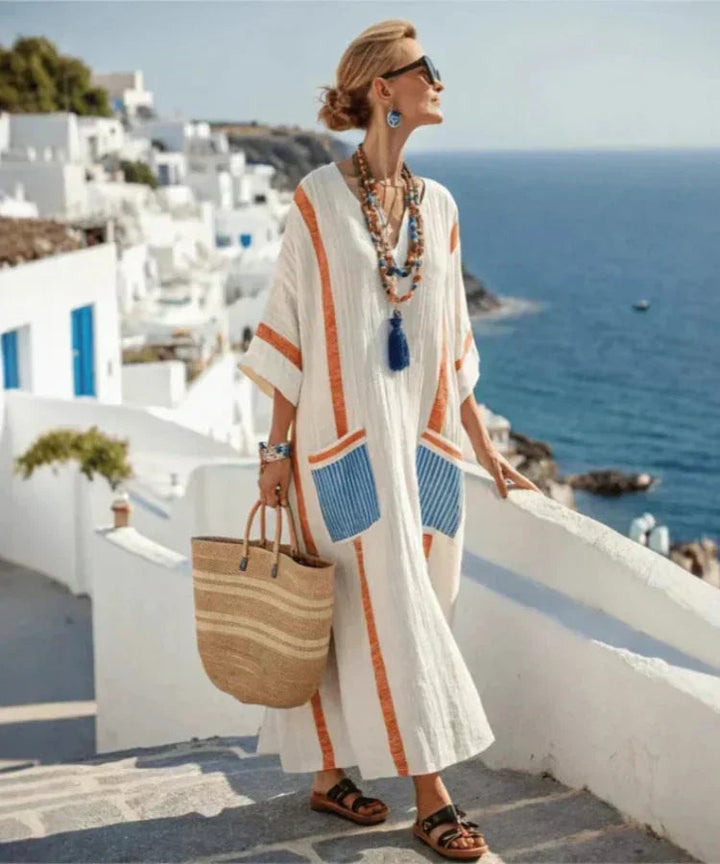 Vestito estivo lungo a righe donna con scollo a V, colori vivaci e vestibilità morbida per la moda casual.