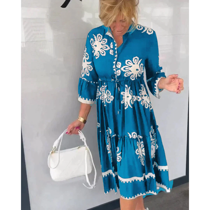 Abito fluido donna, un vestito midi confortevole con cintura regolabile e fantasia floreale, ideale per l'estate.