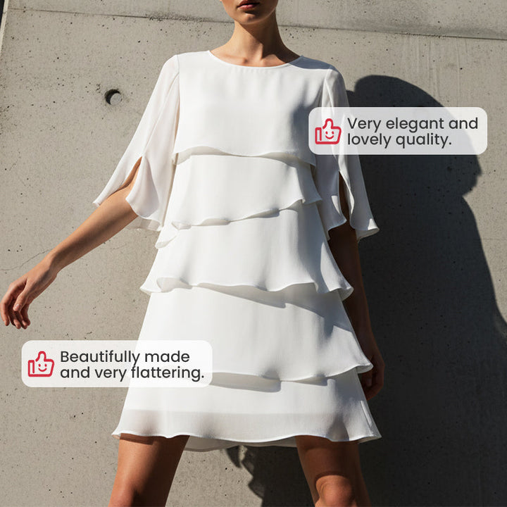 Abito estivo donna elegante a trapezio, con maniche a sbuffo, perfetto per un look fresco e chic.