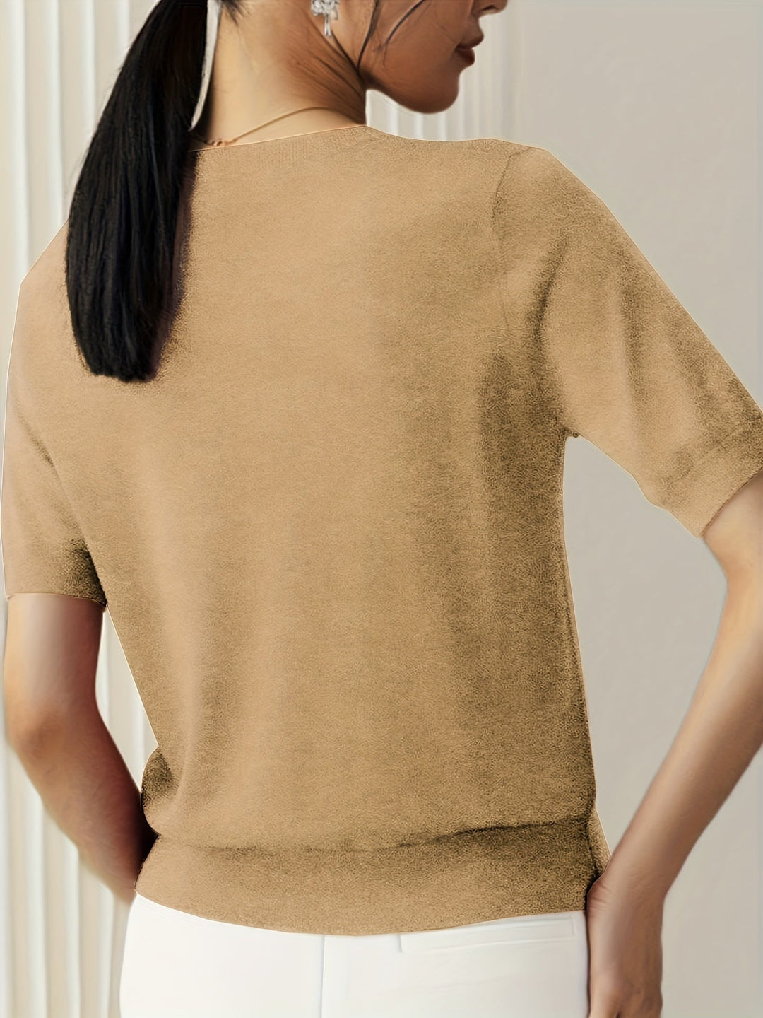 Maglietta donna comoda a maniche corte, vestibilità regolare, per outfit casual.