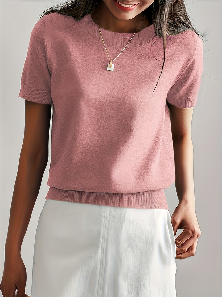 Top donna estivo, maniche corte, comodo e casual, ideale per un look rilassato.
